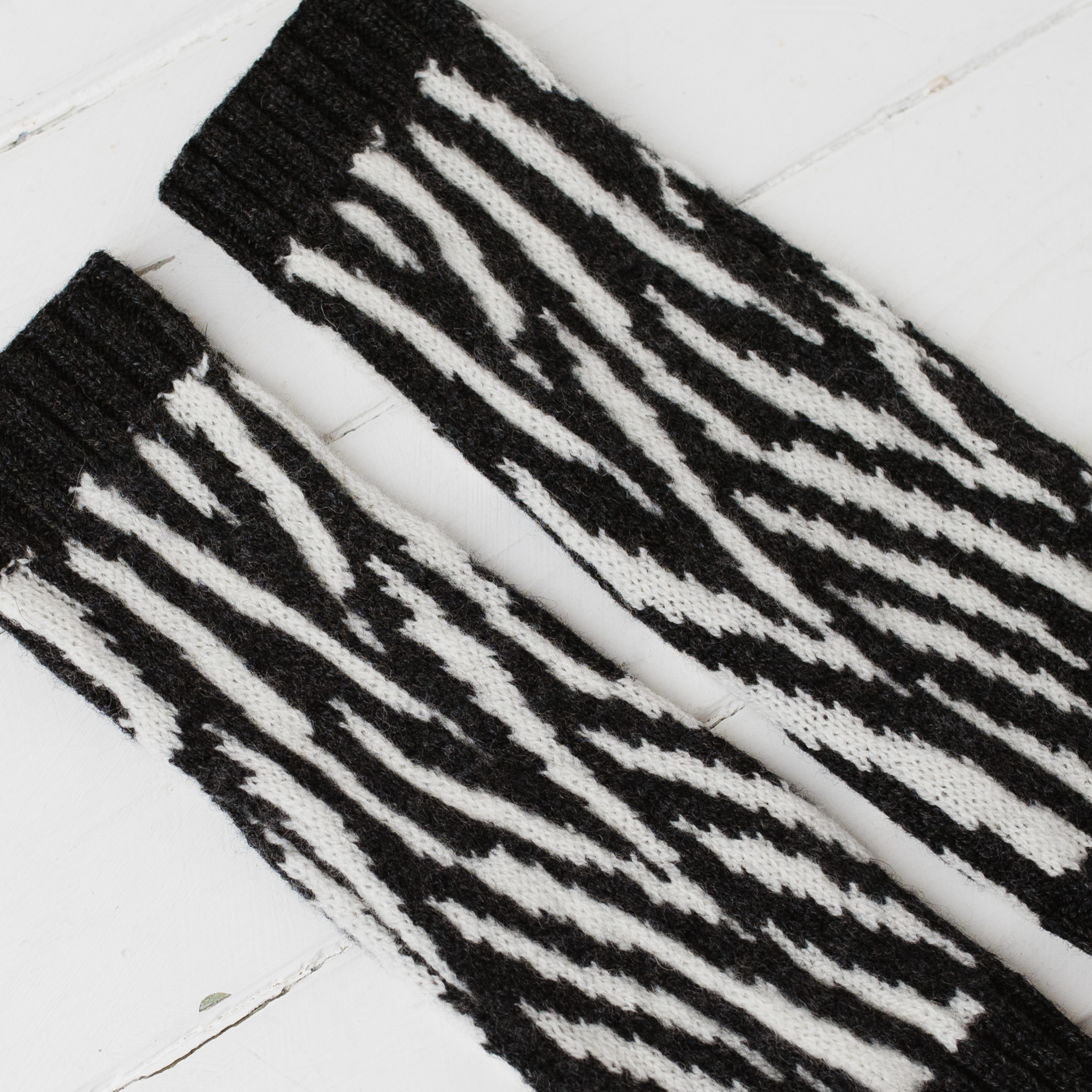Zebra wrist warmers - charcoal and ecru