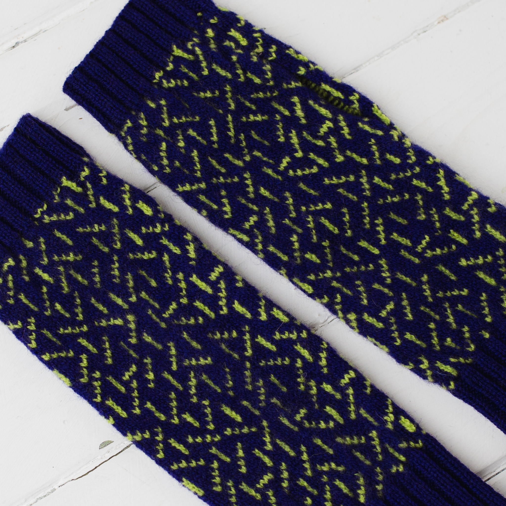 Scatter wrist warmers - nightfall and lime