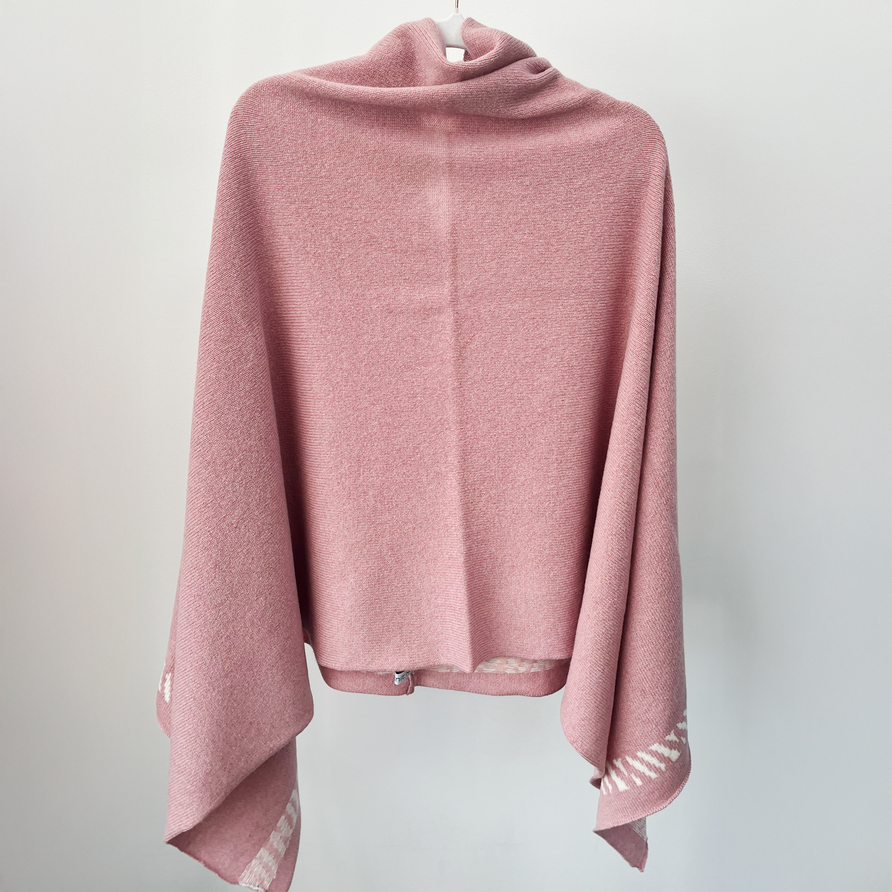 Lambswool knitted poncho - calamine pink and white