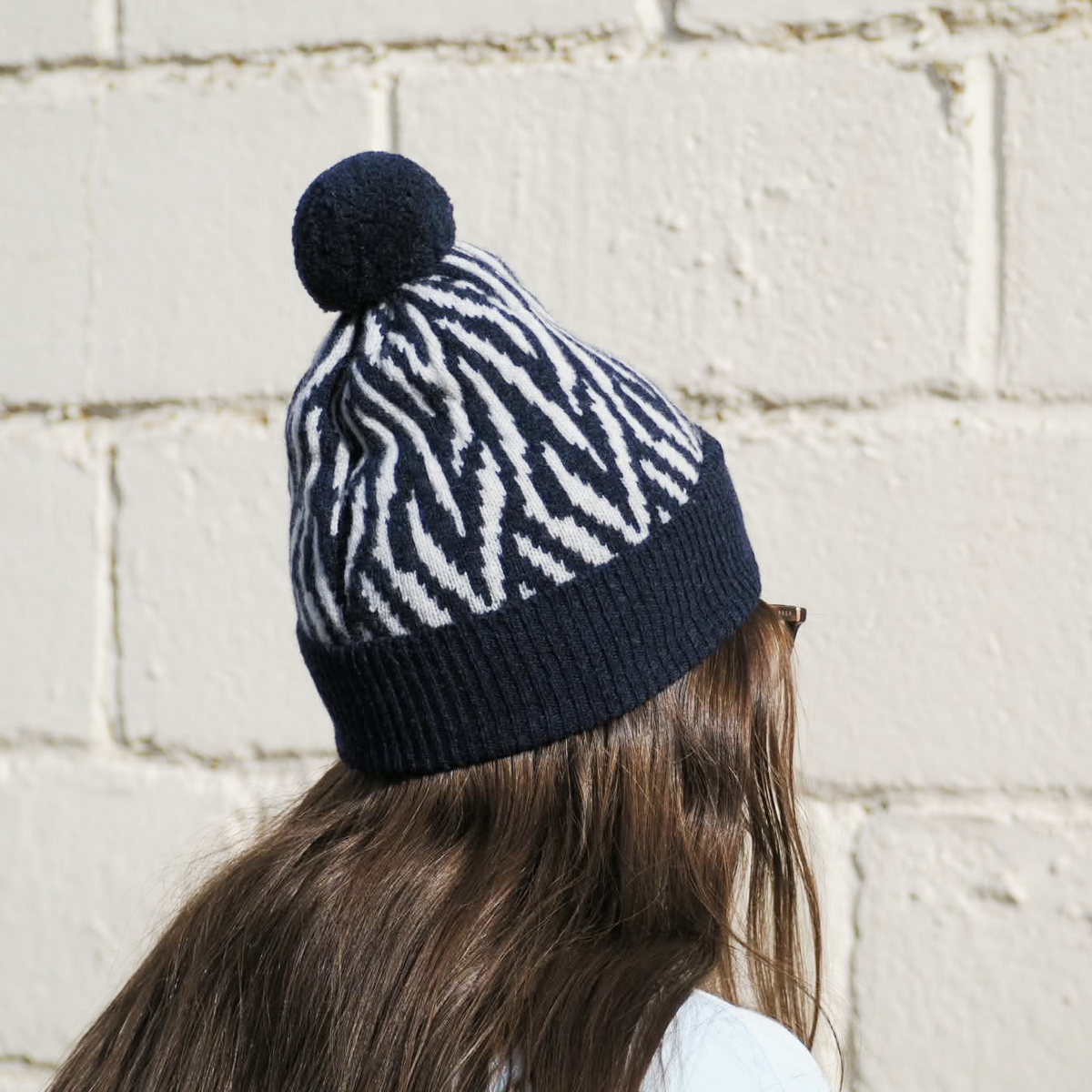 Zebra pom pom hat - navy and zinc
