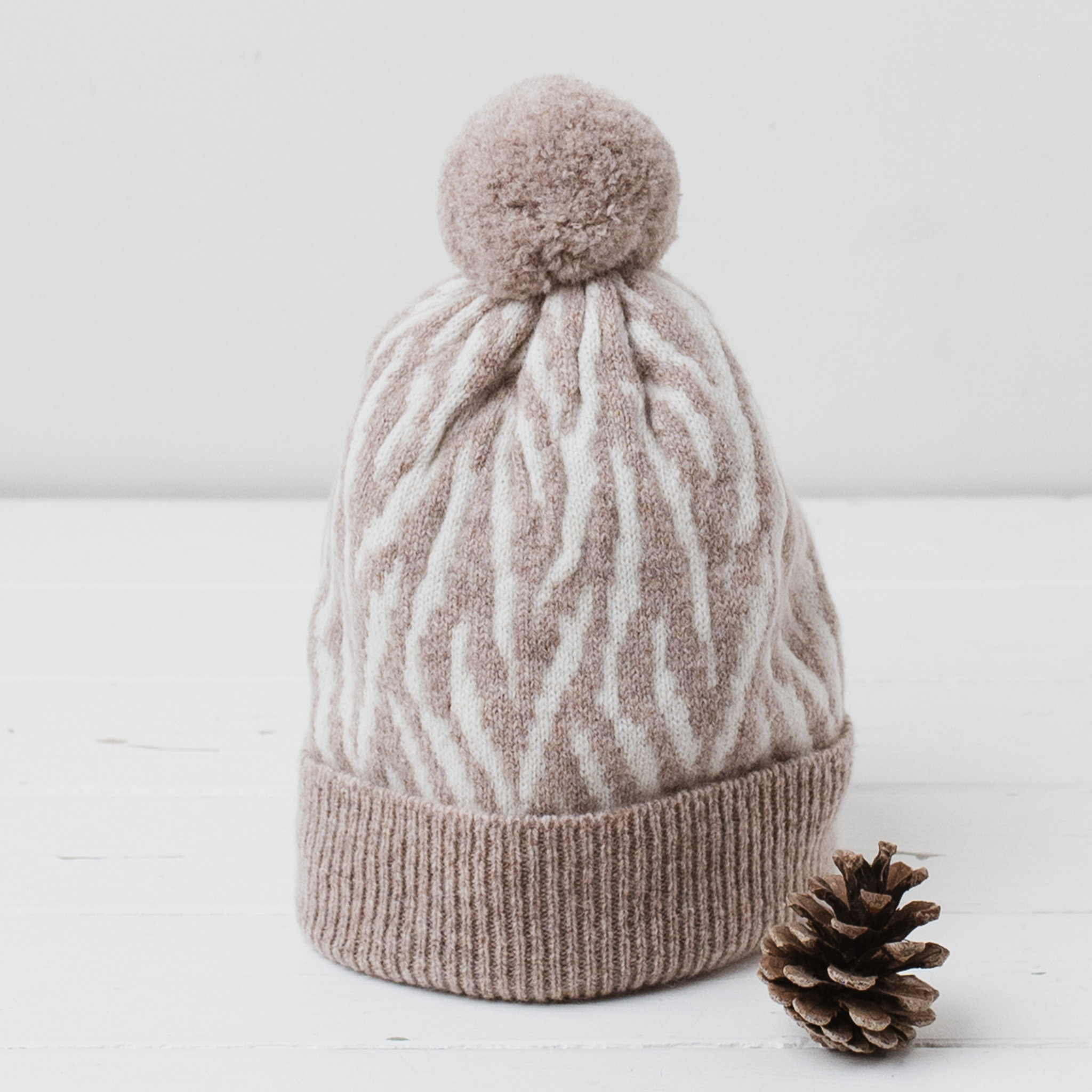 Zebra pom pom hat - cobble and white