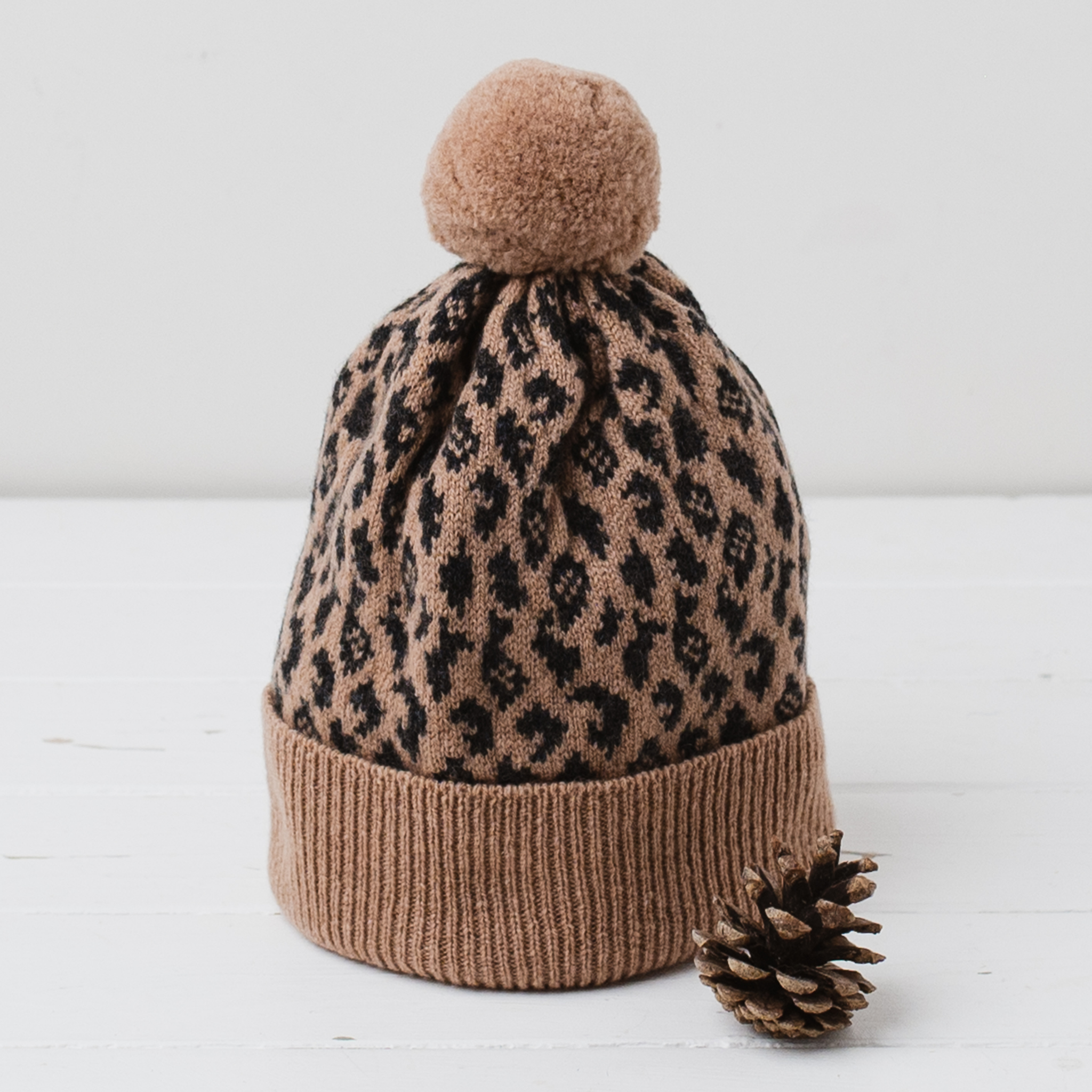 Leopard pom pom hat - camel and charcoal