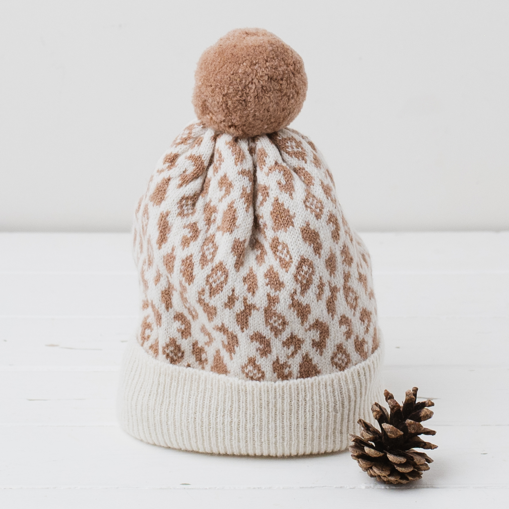 Leopard pom pom hat - ecru and camel