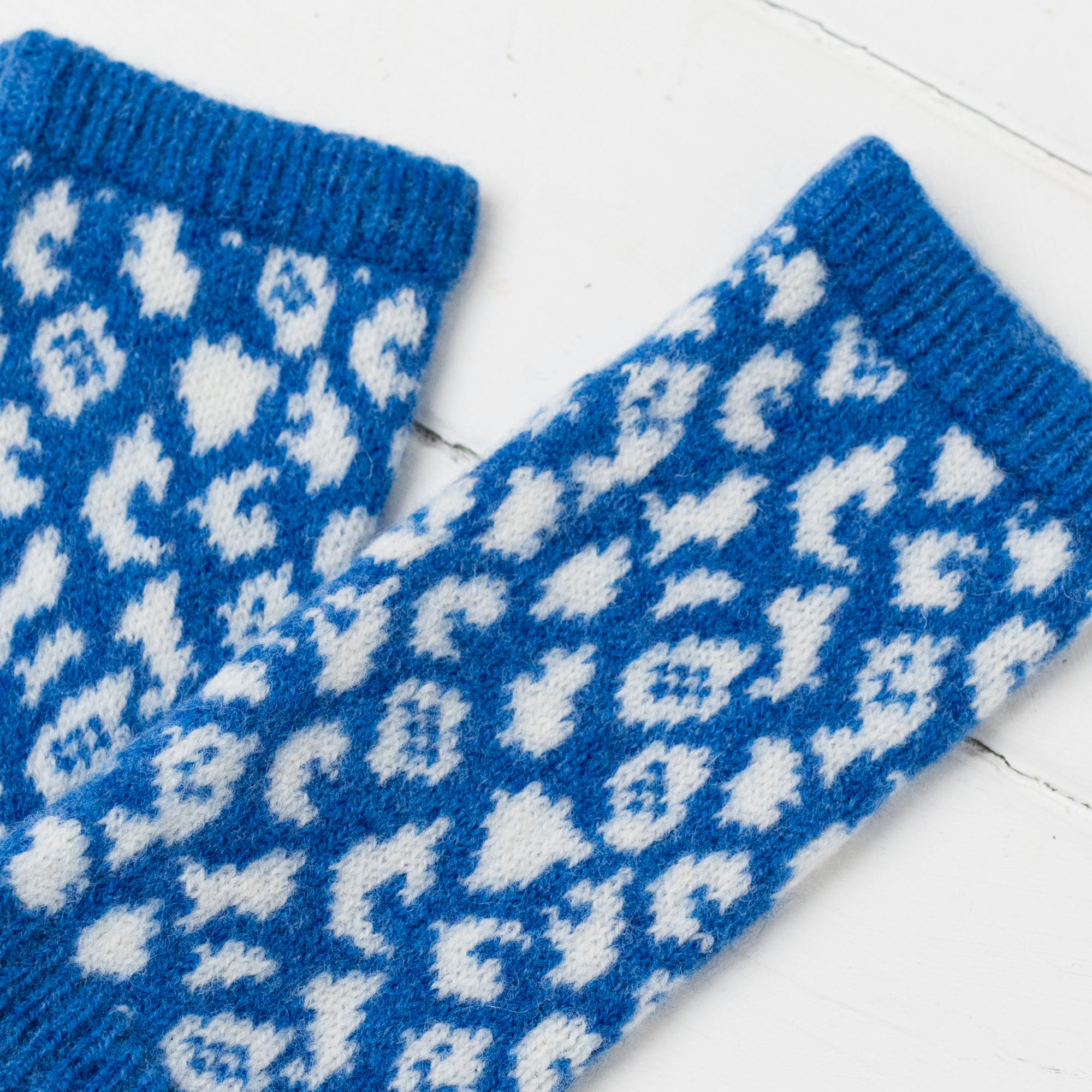 Leopard wrist warmers - river and white