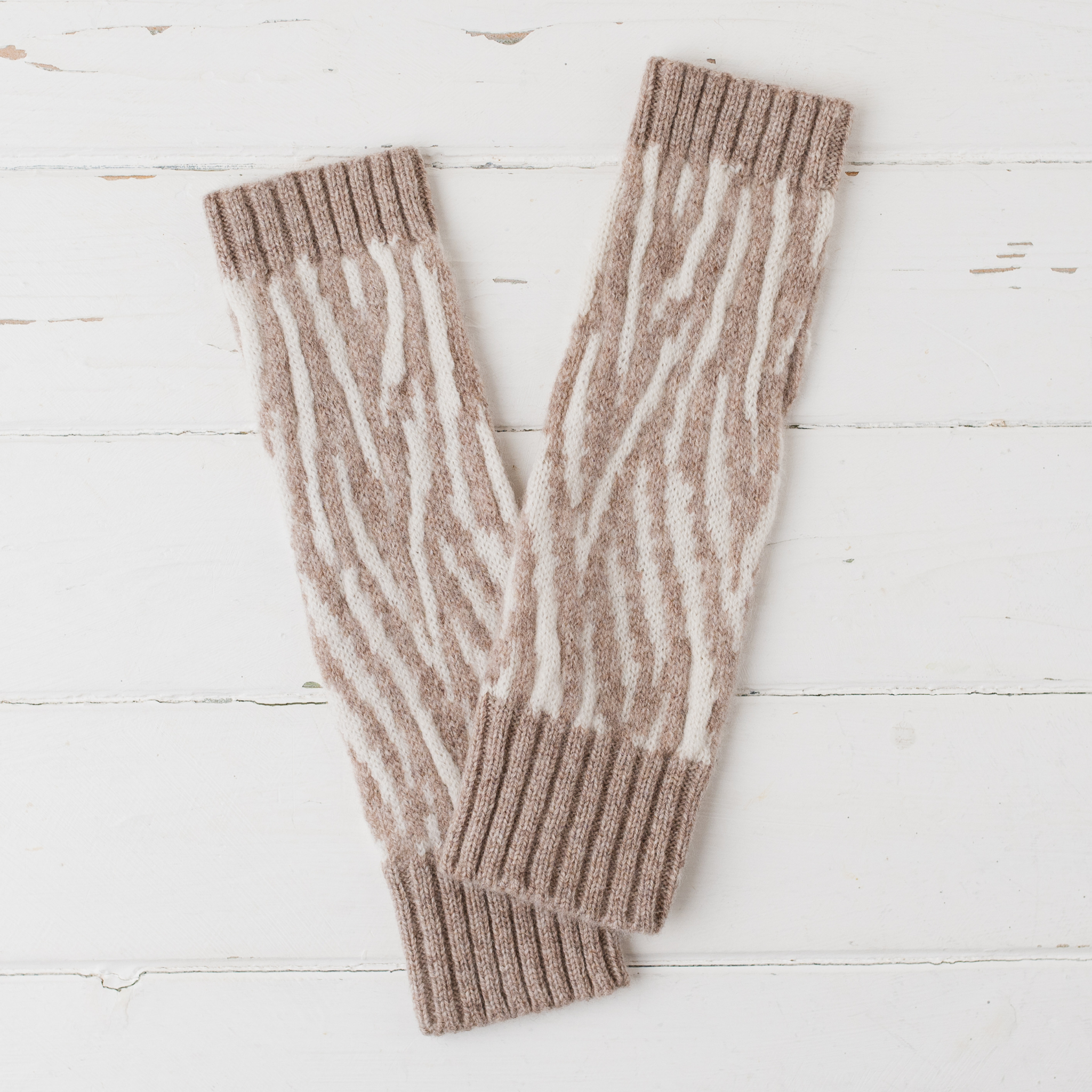 Zebra wrist warmers - cobble and white