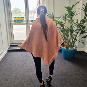 Lambswool knitted poncho - calamine pink and white