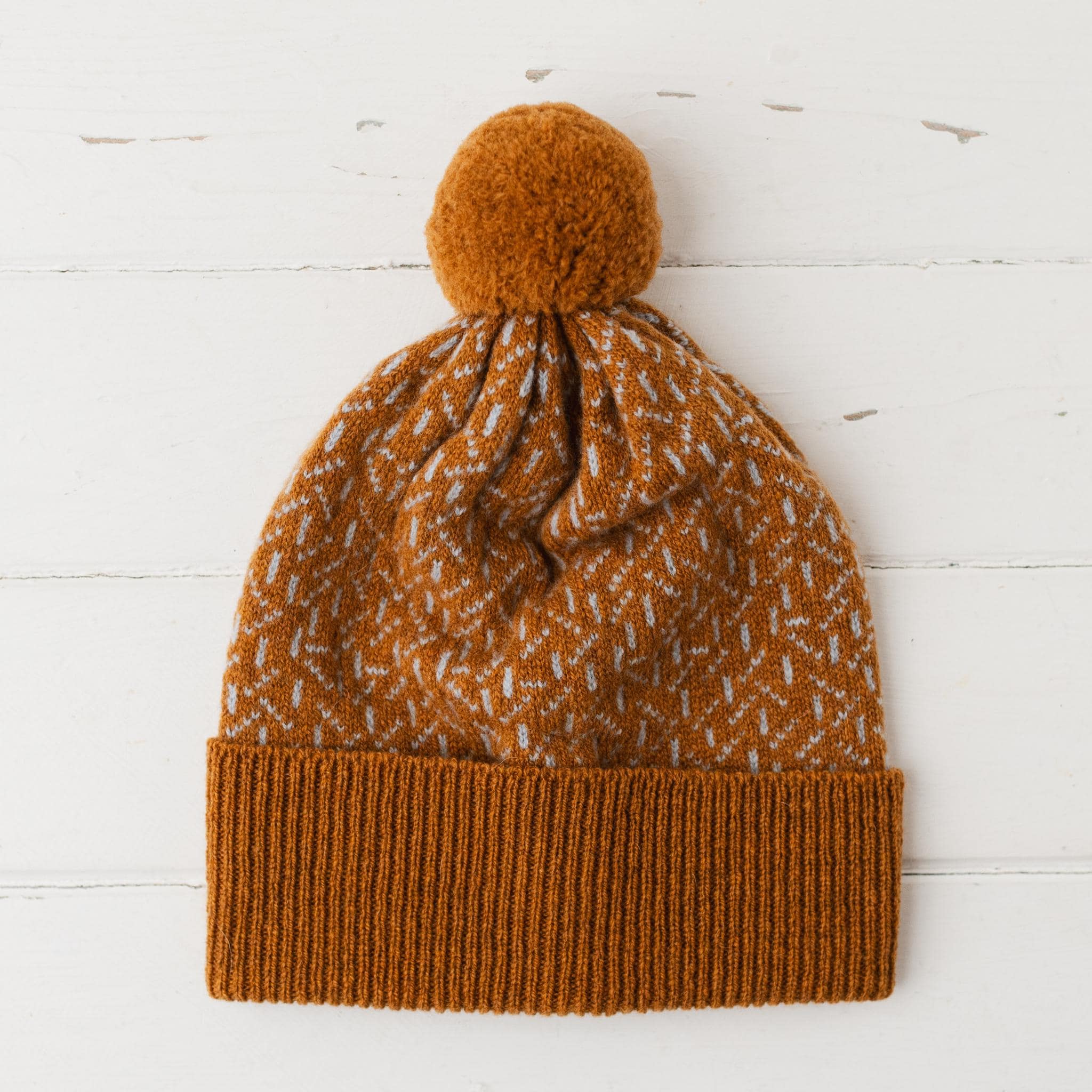 Scatter pom pom hat - sedona and angelite