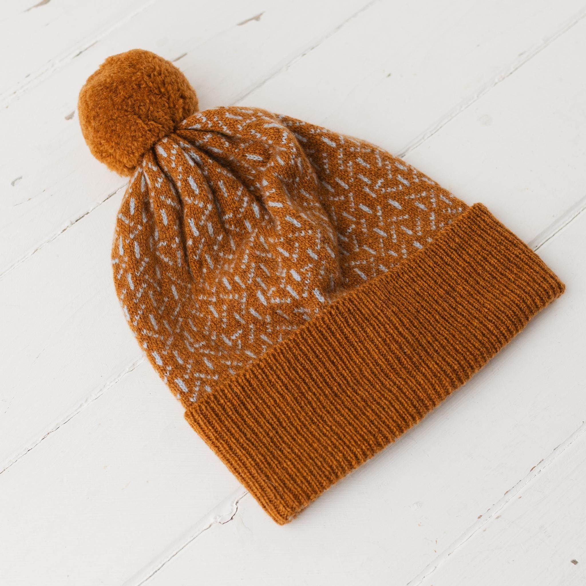 Scatter pom pom hat - sedona and angelite