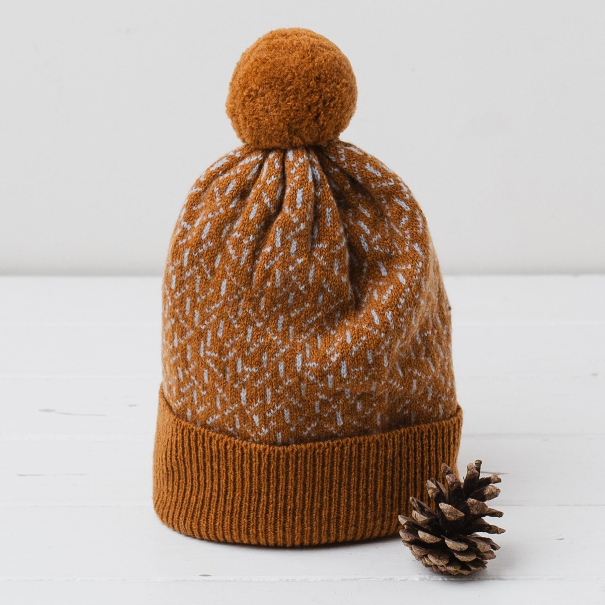 Scatter pom pom hat - sedona and angelite
