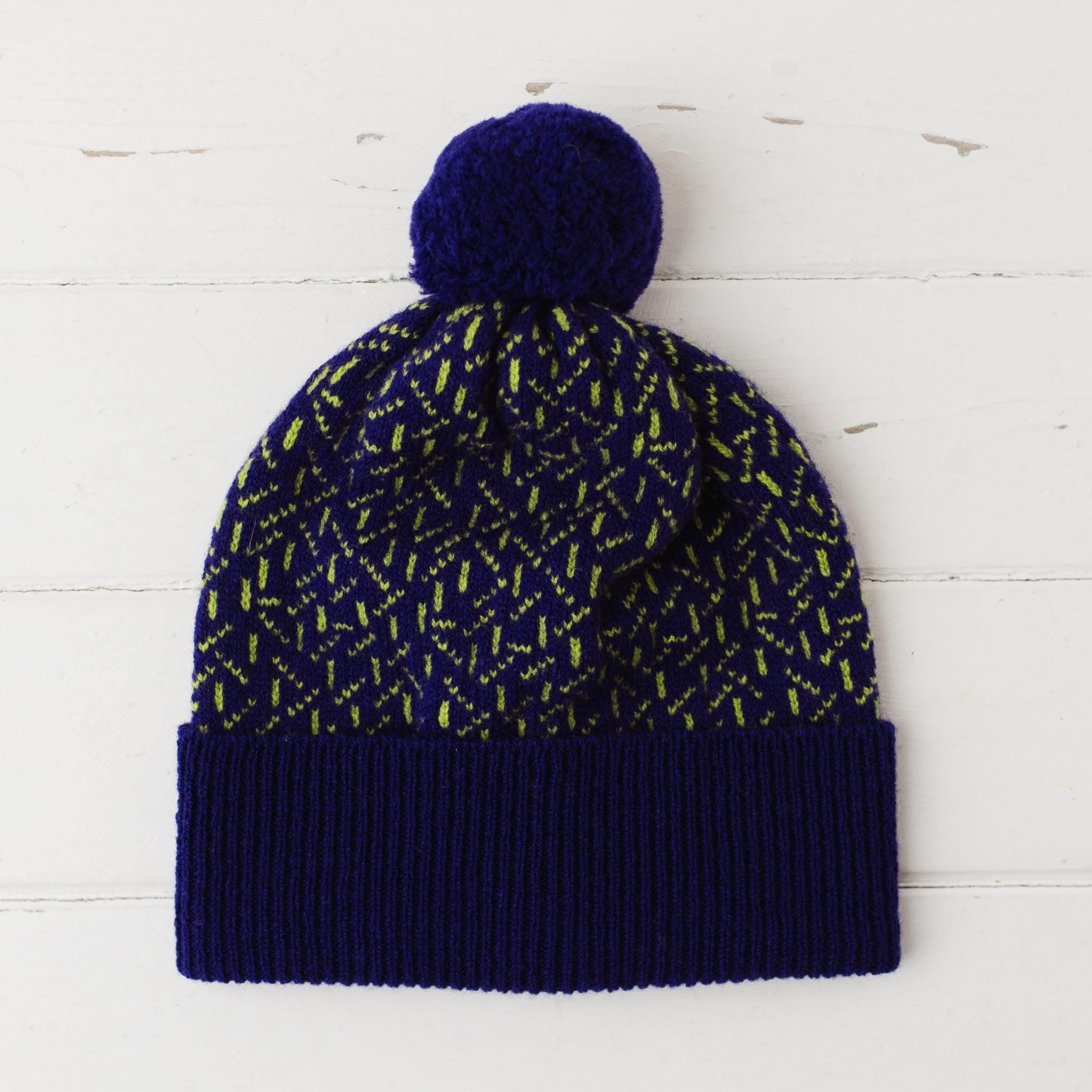 Scatter pom pom hat - nightfall and lime