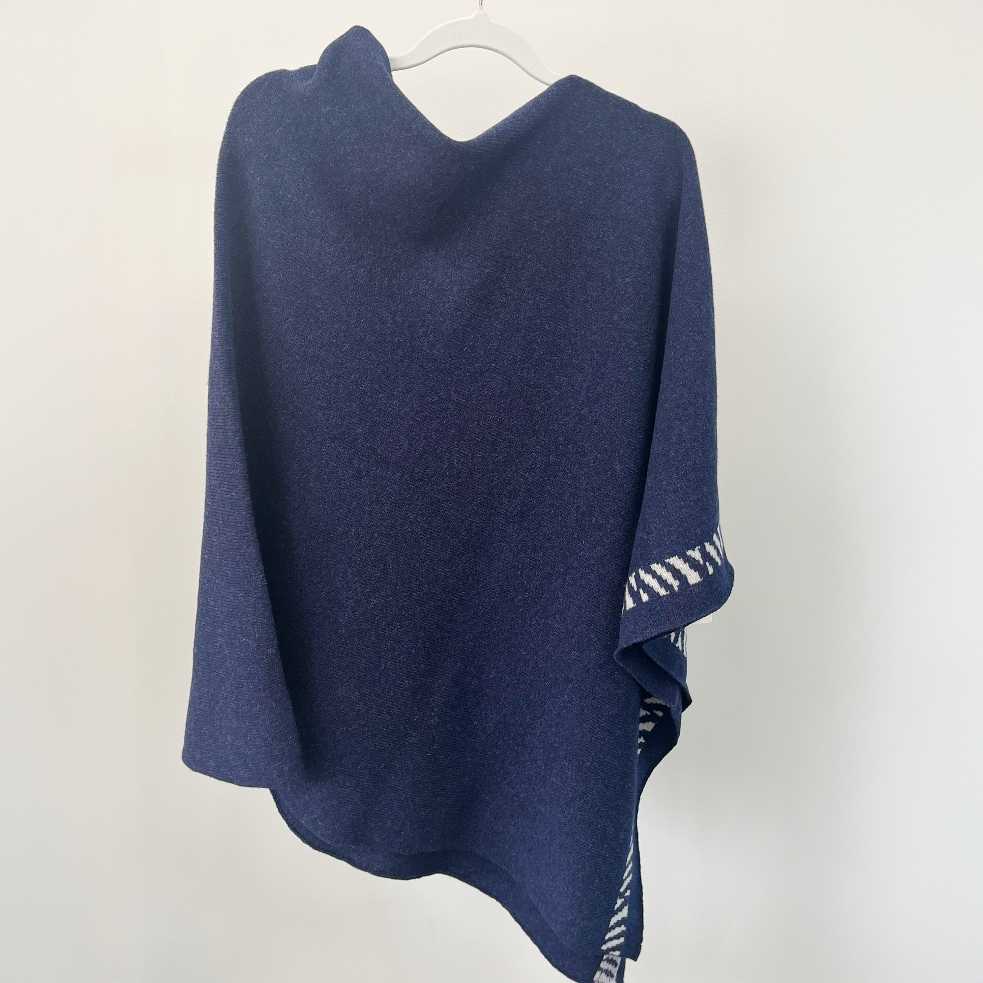 Lambswool knitted poncho - navy and zinc