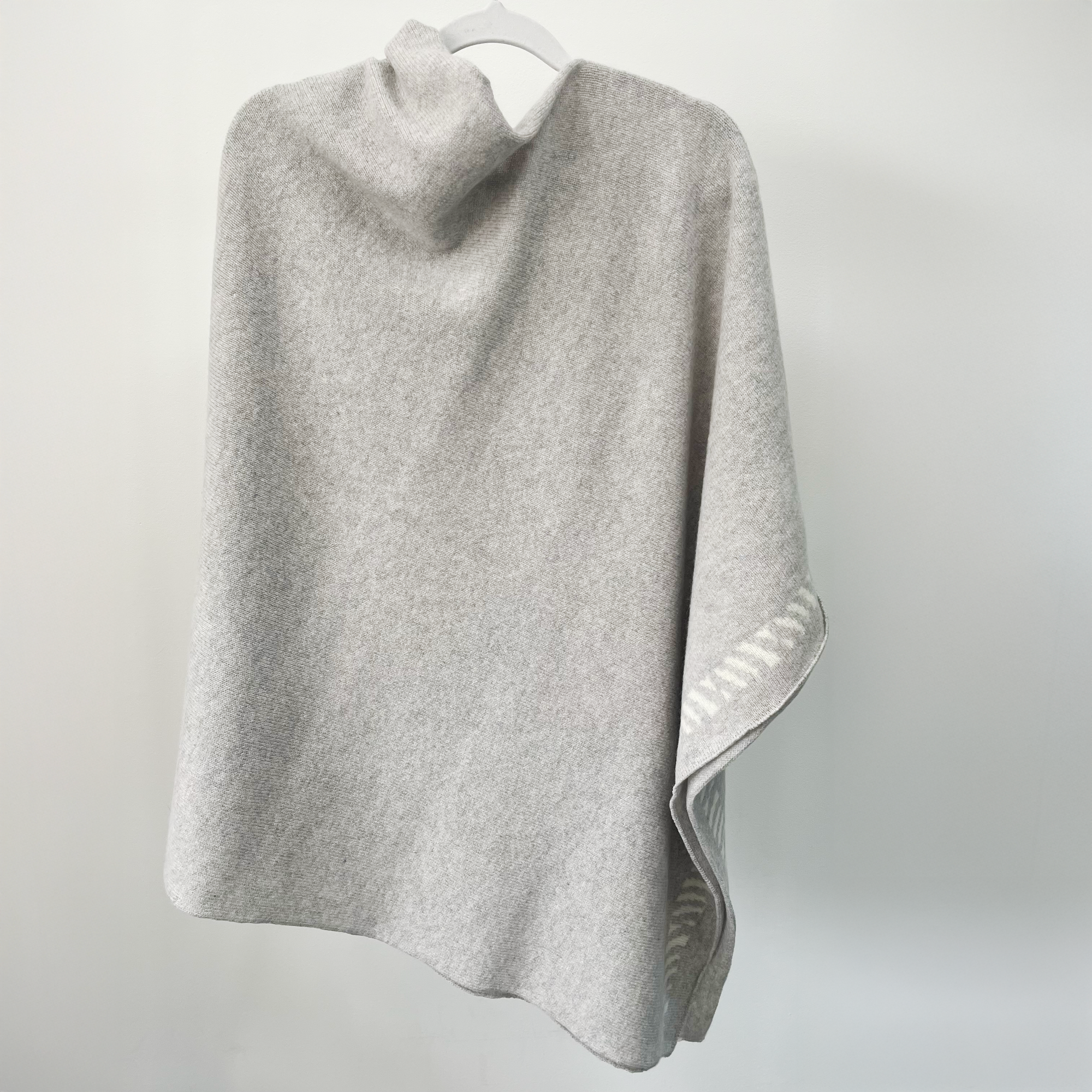 Lambswool knitted poncho - zinc grey and white