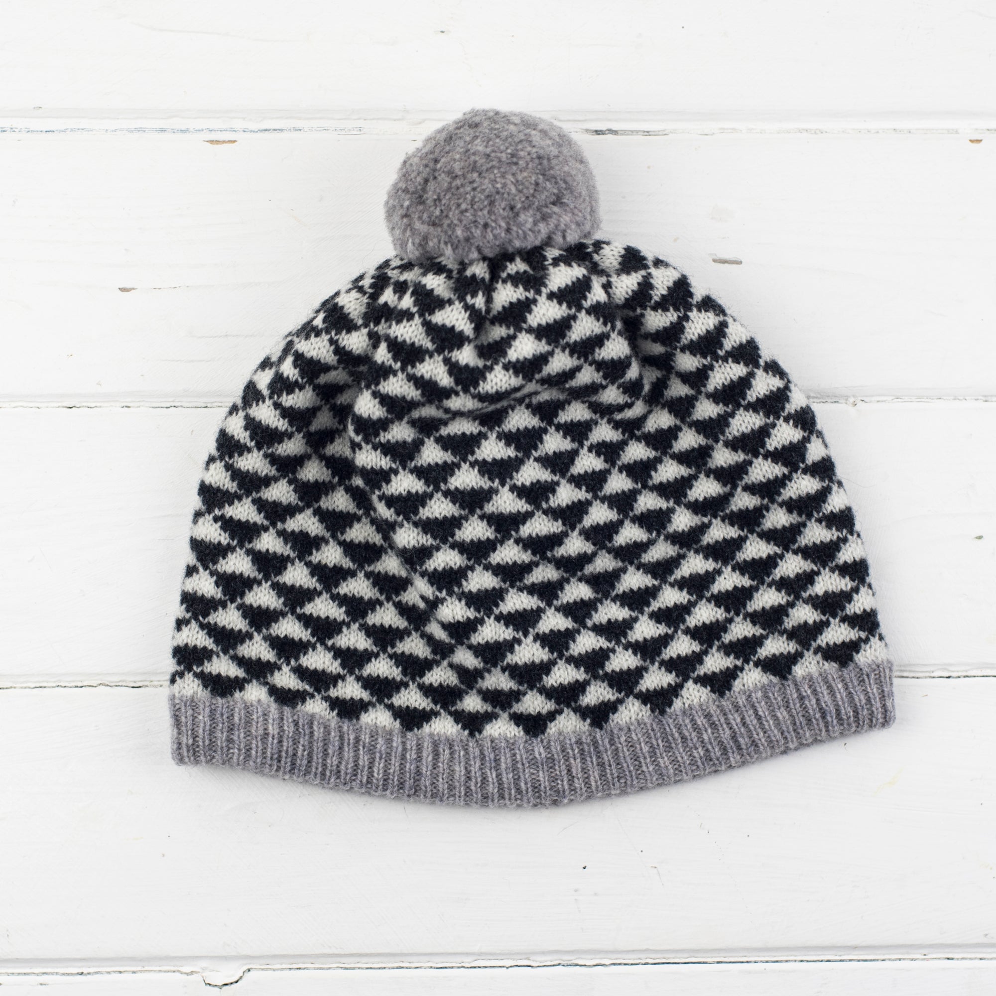 Triangle pom pom hat - monochrome