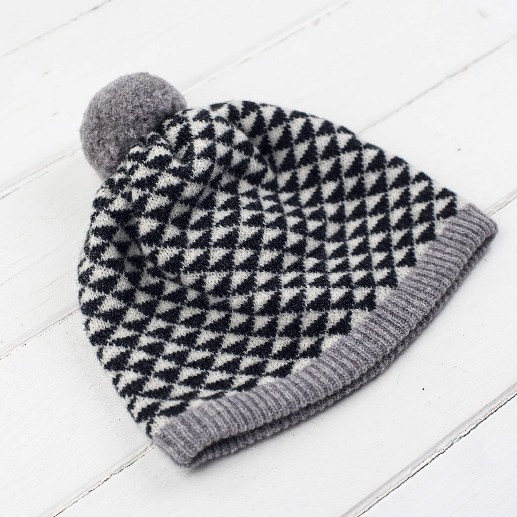 Triangle pom pom hat - monochrome