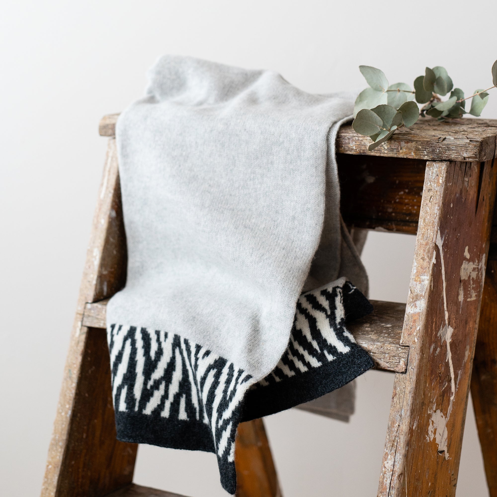 Zebra knitted wrap - zinc and monochrome